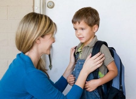 Mom with Son Wearing Backpack 1